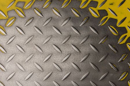 metal grooved plate with yellow trimの写真素材