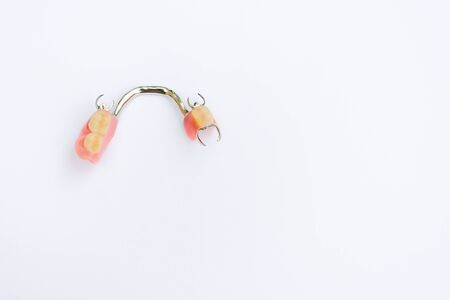 clasp prosthesis on the lower jaw isolatedの写真素材