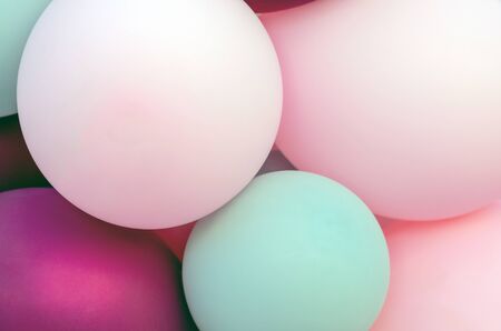 background of balloons of pink purple and light colors. The concept of celebration, party, fun, holiday, birthday. close-upの写真素材