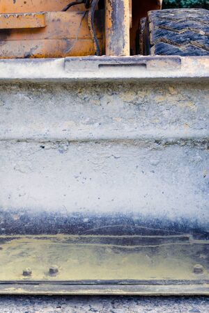 Loader bulldozer bucket for sand bulk cargo coal. front view. copy space. mining conceptの写真素材