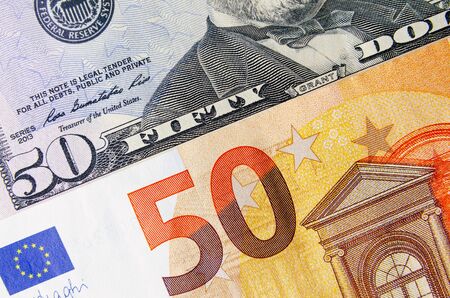 50 euros and 50 American dollars. international finance concept. financial markets. financial exchanges. currency exchange. investment. close-upの写真素材