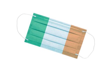 medical face mask with flag of ireland isolated on a white background. Ireland pandemic concept. attribute of Irish doctors. coronavirus in ireland. Ireland pollution news backgroundの写真素材