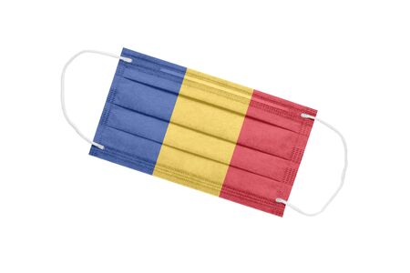 Medical face mask with flag of romania isolated on a white background. Romania pandemic concept. attribute of coronavirus outbreak in Romania. Medicine in Romania.の写真素材