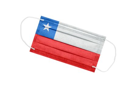Medical mask with flag of chile isolated on white background. Chile pandemic concept. Coronavirus outbreak attribute in Chile. Medicine in Chile.の写真素材
