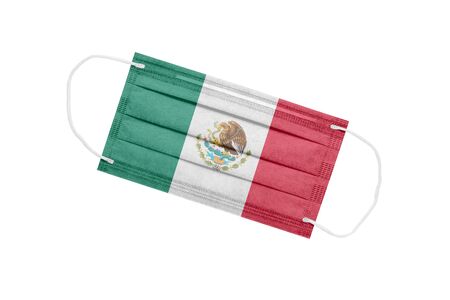 Medical mask with flag of mexico isolated on white. Mexico pandemic concept. Coronavirus outbreak attribute in Mexico. Medicine in Mexico.の写真素材