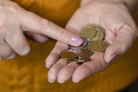 Counting small money in the palm of your hand