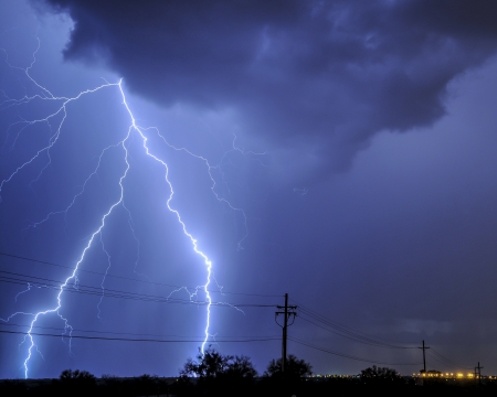 Lightning over power lines