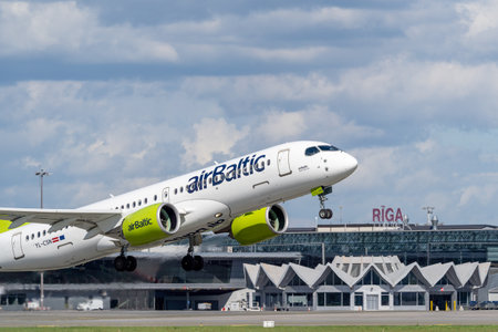 Marupe, Latvia - August 4, 2023 - Riga airport terminal and Latvian AirBaltic airplanes in the foregroundのeditorial素材