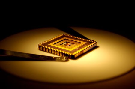 Extreme close-up of computer micro chip .