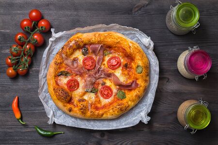 Pizza cherry chilly mozzarella prochuttoの写真素材