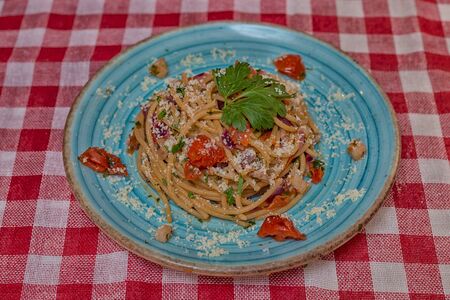 Spaghetti allAmatriciana tomatto bacon parsleyの写真素材