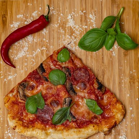 Pizza chorizo mozzarella fungi chillyの写真素材