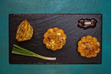 Muffins with cheese gouda cheddar eggsの写真素材