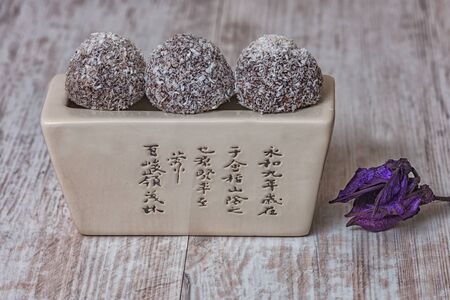 Vegan bombons cacao cocnut butter close flowerの写真素材