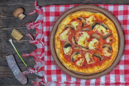 Pizza proscuitto funghi parmigiano chorizo onion redの写真素材
