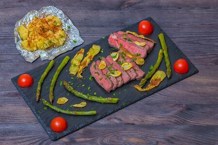 Steak patatos ginger garlic chipsの写真素材