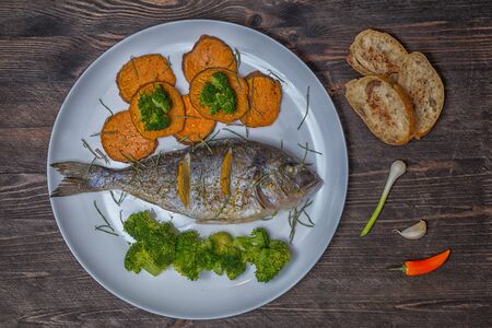 Bream patat broccoli bread onionの写真素材