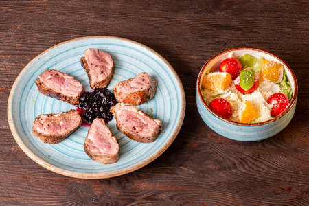 Duck breast blueberry iceberg saladの写真素材