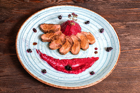 Duck breast blueberry red mushの写真素材