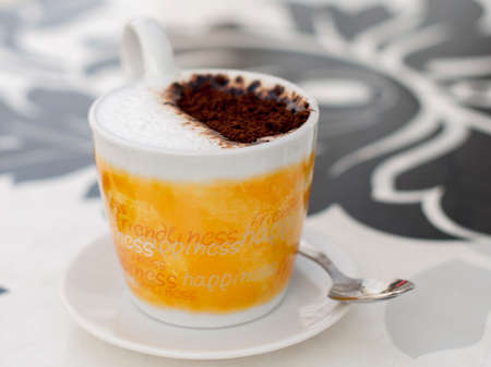Instant coffee cream milk yellow cup spoonの写真素材