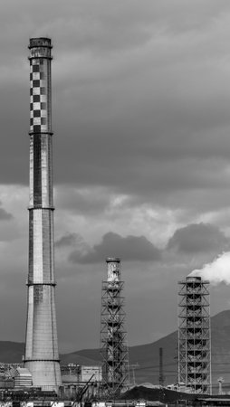 Thermal Coal Power plant chimney blue sky black and whiteの写真素材