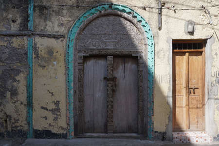 Beautiful wooden door in the old town of Lamu, Lamu Island, Kenyaの写真素材