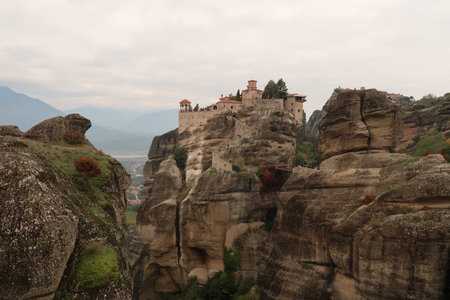 The Monastery of Varlaam appearing between rock formations, Meteora, Greece 2021の写真素材