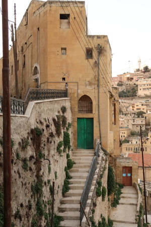 Beautiful house with a bright green door in As-Salt, Salt, Jordan 2021の写真素材
