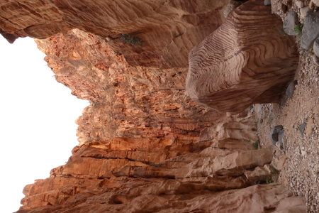 Big colorful, striped rock in the Whadi Ghuweir Canyon, Dana, Jordan 2021の写真素材