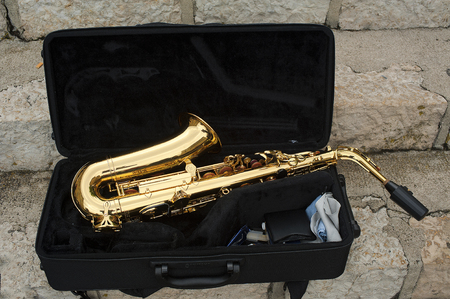 saxophone in a box During a pause of a concertの写真素材