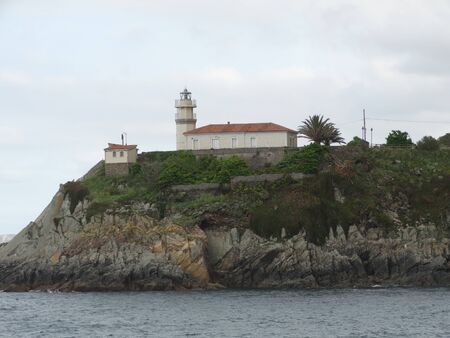 view of the lighthouse of Cudillero, Asturias, Spainの写真素材