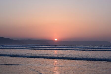 Sunset view at Salinas beach, Asturias, Spainの写真素材