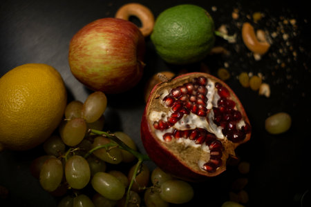 pomegranate on the tableの写真素材