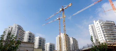 Urban landscape of Beersheba, Israel, featuring modern residential buildings, a green city park,...