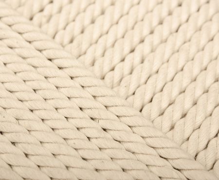 Heavy, white coiled rope.
