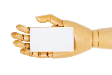 Wooden, human hand with white card isolated on a white backgroundの写真素材