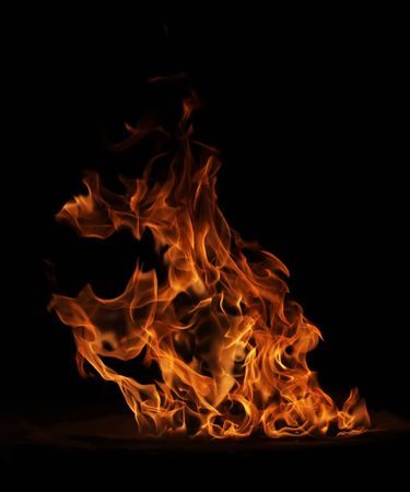 Fire flame isolated on black backgoundの写真素材