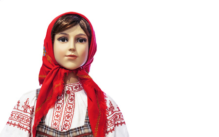 Female mannequin in national Russian costume on a white background.の写真素材