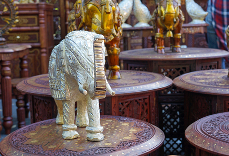 Silver decorative figurines of an Indian elephant in a street shop.の写真素材