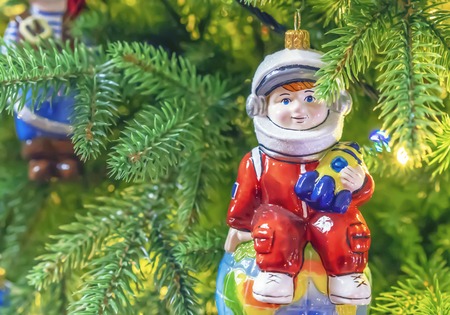 Christmas decorations. Astronaut. Glass Christmas toys.の写真素材