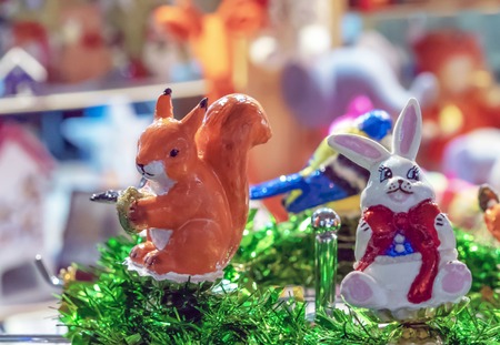 Squirrel with a nut. Glass Christmas toys.の写真素材