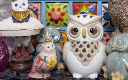 Different figurines of owls in the gift shop.の写真素材
