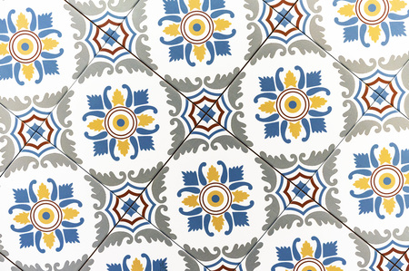 Ceramic tiles with colored ornaments. Background and texture of ceramic tiles.