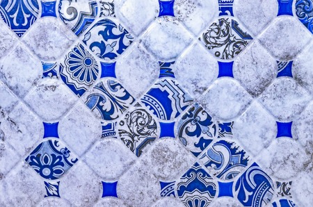 Ceramic tile with a blue abstract pattern. Background and texture of ceramic tiles.の写真素材