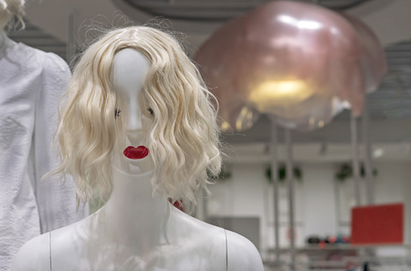 White female mannequin in a clothing store. Female dummy.の写真素材