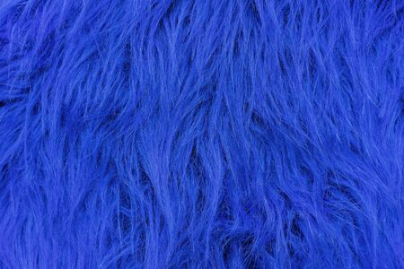 Texture of blue artificial fur. Fur background for design and decoration.の写真素材