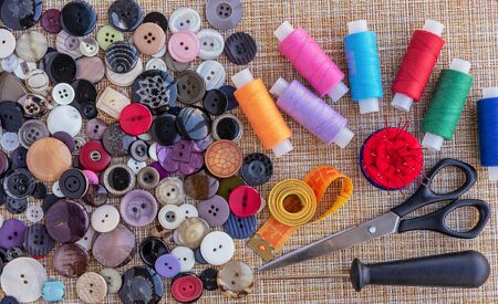 Sewing threads, buttons for clothes and other accessories for sewing and needlework. ?oncept of sewing accessories.の写真素材