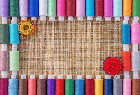 Multicolored sewing threads. Spools of thread for sewing. The concept of sewing accessories.