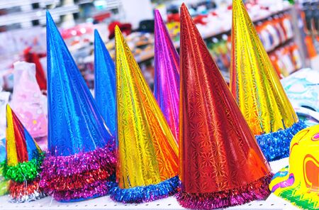 Shiny party hats with tinsel decoration for children's parties.の写真素材