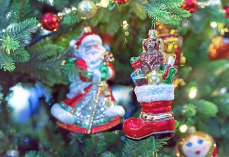 Glass Christmas tree toy - red boot Santa Claus's with gifts. Christmas decor in vintage style.の写真素材